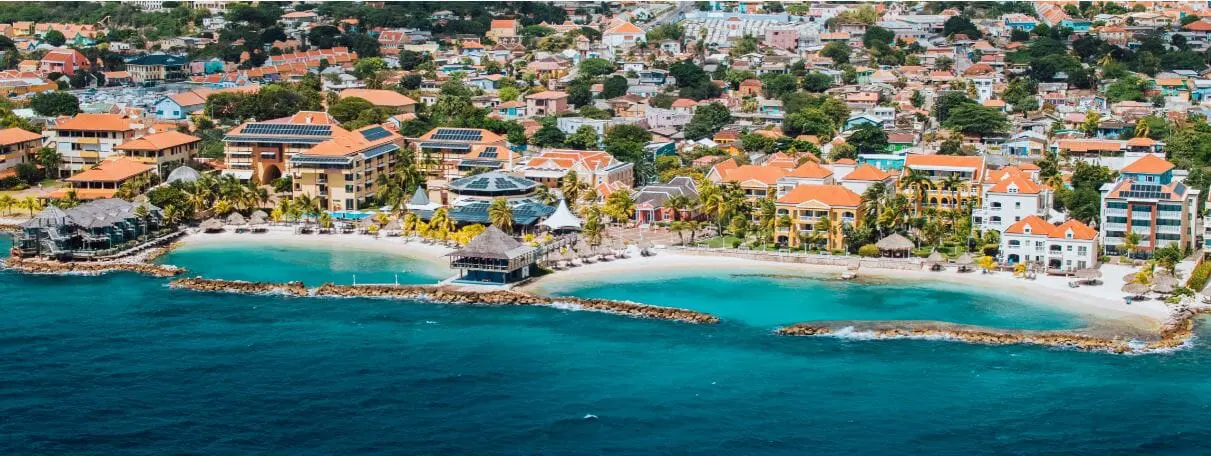 Avila Beach Hotel historic boutique property with private beach, colonial architecture, and waterfront dining in Willemstad, Curaçao.