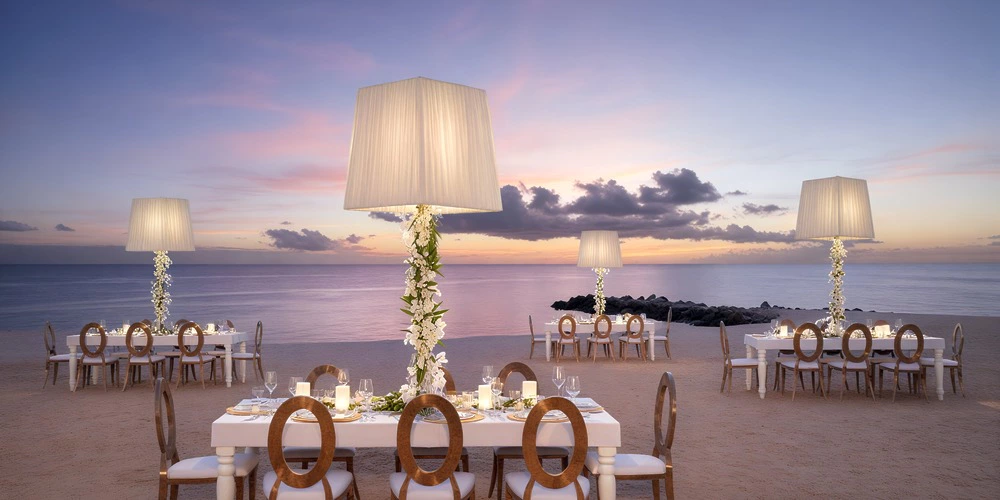 Beach Club oceanfront wedding reception setup at Zoëtry Curaçao Resort & Spa