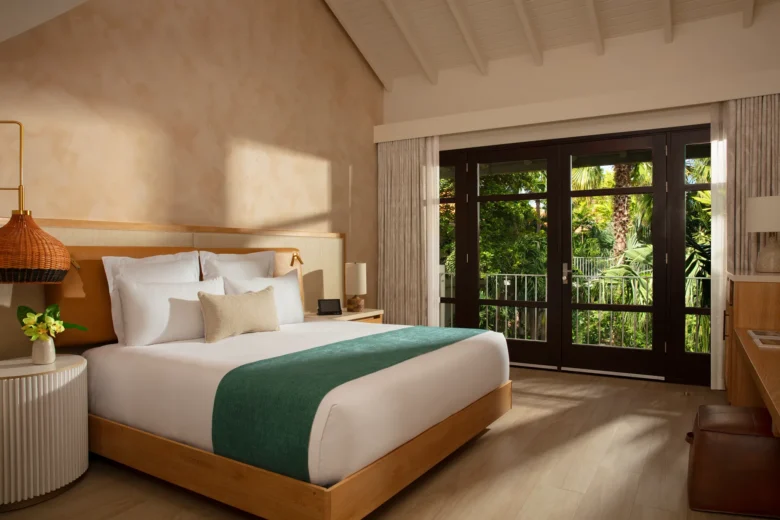 Junior Suite Garden View bedroom with king-size bed at Zoëtry Curaçao Resort & Spa.