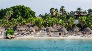 Kontiki Beach Resort Curaçao beachfront property with tiki-style accommodations, Caribbean Sea views, and laid-back island atmosphere.