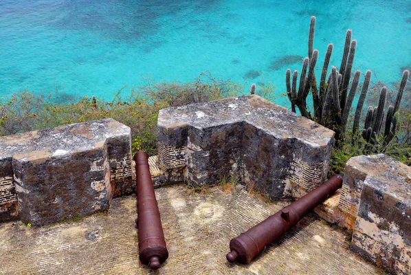 Rif Fort near Zoëtry Curaçao Resort & Spa overlooking turquoise waters and historic stone cannons in Willemstad