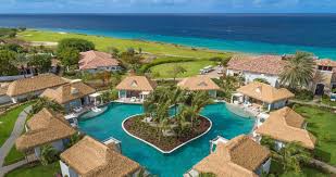 Sandals Royal Curaçao couples-only luxury all-inclusive resort with overwater bungalows, multiple pools, and Caribbean beachfront.