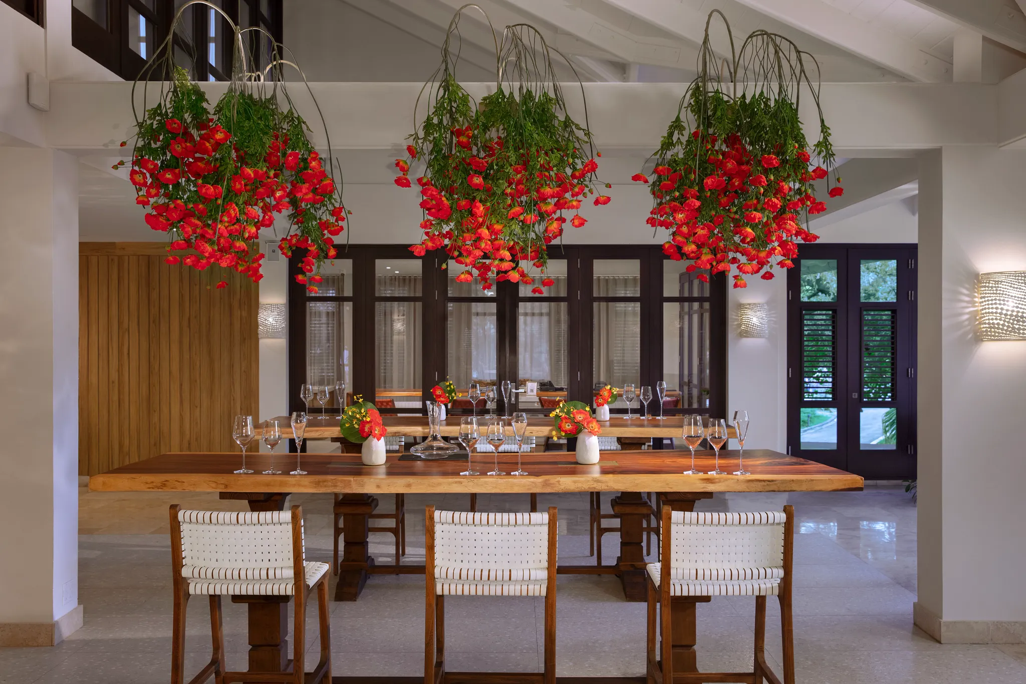 Elegant wine tasting setup at Cork & Cordial bar inside Zoëtry Curaçao Resort & Spa.